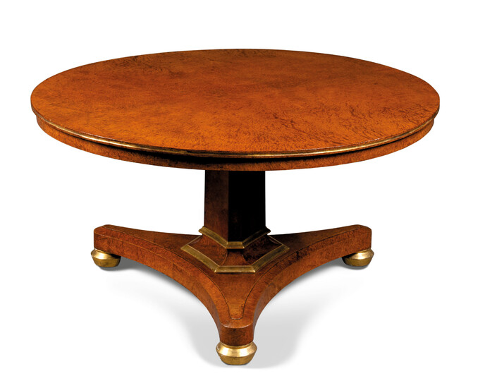 A GEORGE IV PARCEL-GILT AMBOYNA CENTRE TABLE