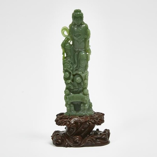 A Green Hardstone Guanyin with Five Boys on Hardwood