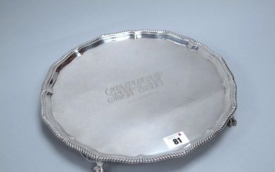 A Hallmarked Silver Salver, TB&S, Sheffield 1919, of shaped ...