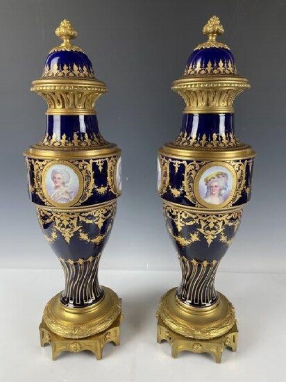 A LARGE PAIR OF 19TH C. ORMOLU MOUNTED SEVRES VASES