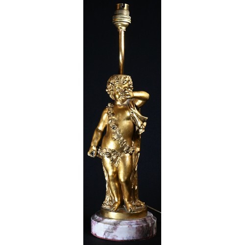 A Louis XVI style gilt bronze figural table lamp, cast as a ...