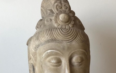 A Marble Head of Buddha.
