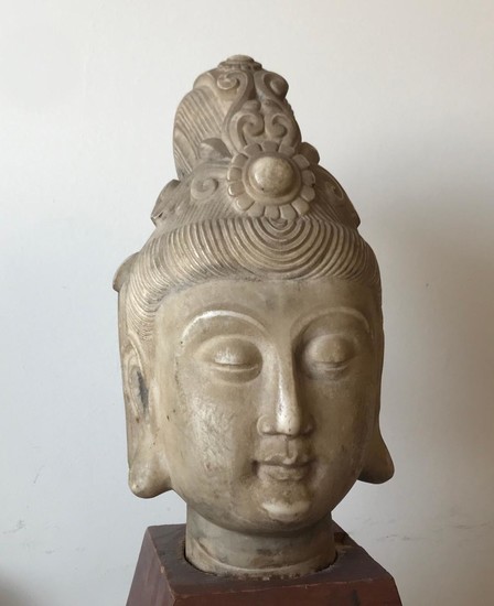 A Marble Head of Buddha.