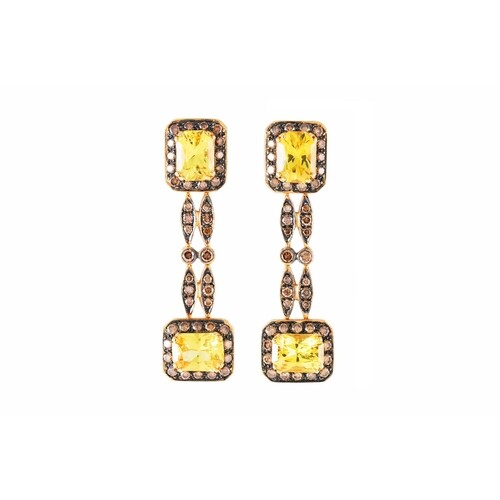 A PAIR OF YELLOW SAPPHIRE AND BLACK DIAMOND EARRINGS, of clu...
