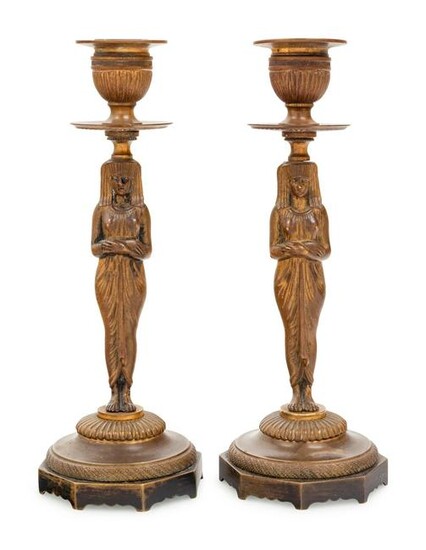 A Pair of Egyptian Revival Bronze Figural Candlesticks