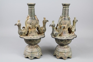 A Pair of Unusual Chinese Vases, the vases raised on a lotus...
