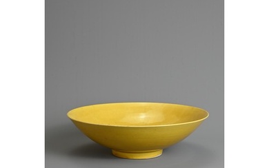 A RARE CHINESE YELLOW GLAZED PORCELAIN SHALLOW BOWL, MARK AN...