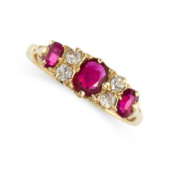 A RUBY AND DIAMOND DRESS RING set with a trio of