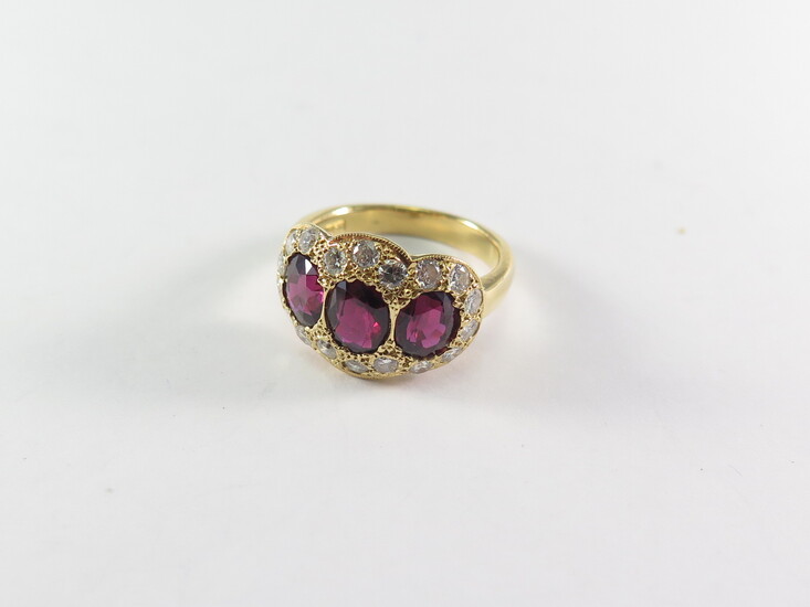 A RUBY AND DIAMOND TRIPLE CLUSTER RING
