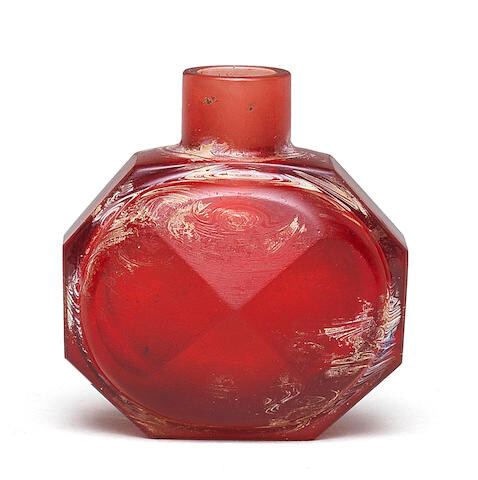 A RUBY-RED GLASS FACETED SNUFF BOTTLE