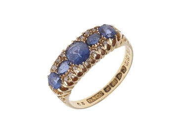 A SAPPHIRE AND DIAMOND RING. mounted with five oval-shaped s...