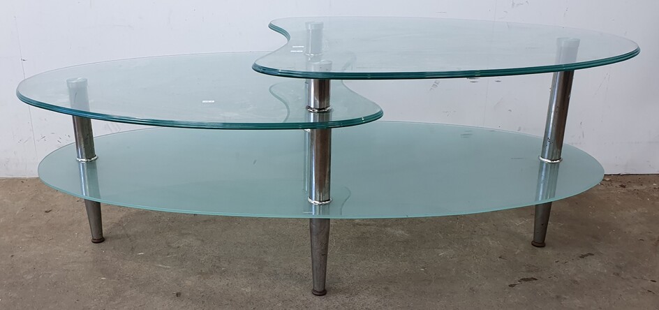 A THREE TIER CHROME AND GLASS COFFEE TABLE