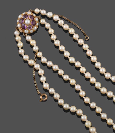 A Two Row Cultured Pearl Necklace, the 107:115 pearls knotted...