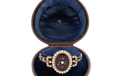 A Victorian garnet, split pearl and diamond hinged bangle