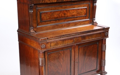 A William IV mahogany metamorphic writing desk in the manner...