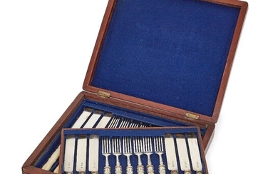 A cased set of Edwardian silver dessert knives and forks, London, c.1909, Holland, Aldwinckle & Slater, comprising twelve each knives and forks with carved ivory handles, in fitted wooden case