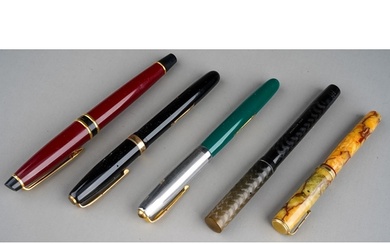 A collection of four vintage Waterman's fountain pens to inc...