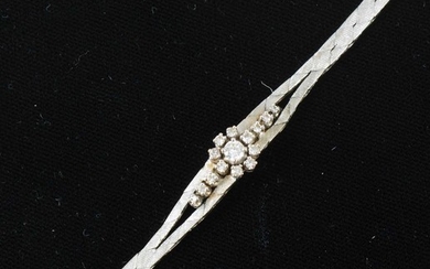A diamond set bracelet.