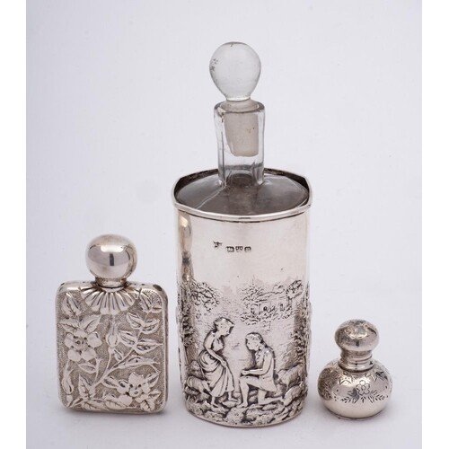 A glass scent bottle in a silver mount, maker George Nathan ...