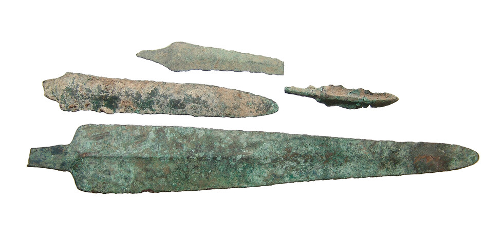 A group of 4 Near Eastern bronze blades