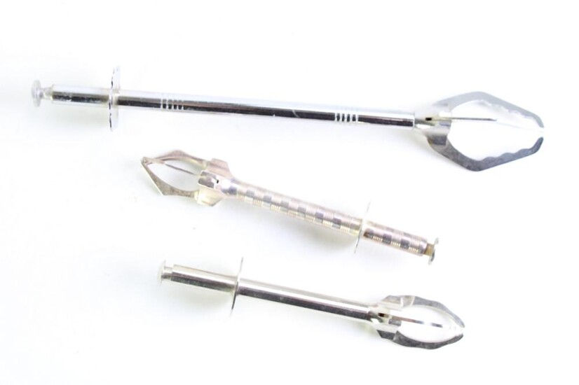 A pair Of French silverplated ice tongs together with two stainless steel examples (Largest L:22cm)