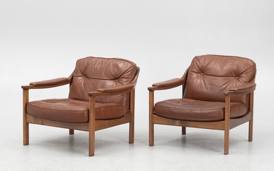 A pair of 1970's armchairs.