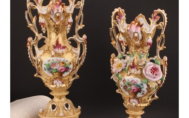 A pair of 19th century French porcelain vases, in the Rococo...