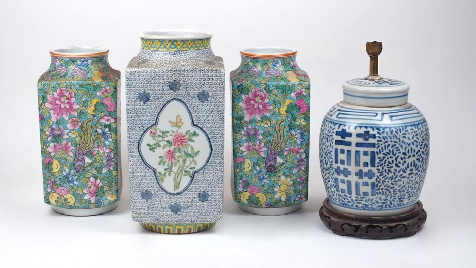 A pair of Chinese export square vases, late 20th century, the green ground decorated overall with flowers, exotic birds and butterflies, 32cm high; together with a Chinese export square vase, 20th century, the sides decorated with quatrofoil panels...