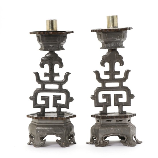 A pair of Chinese late Qing circa 1900 pewter altar candlesticks. H. 26 cm. (2)