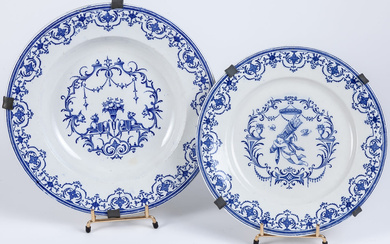 A pair of French pottery blue and white dishes,...