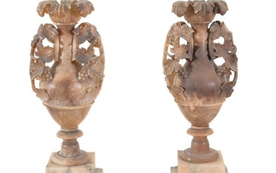 A pair of Italian turned and carved alabaster vases