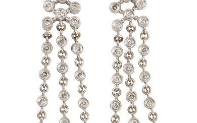 A pair of diamond and 14k white gold earrings