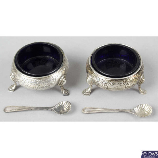 A pair of early George III silver cauldron salts, together with a set of four late Victorian silver open salts.