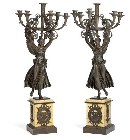 A pair of large French late Empire black patinated candelabra. First half of the 19th century. H. 95 cm. (2)
