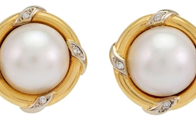 A pair of mabe cultured pearl and diamond earclips, each centring on a mabe pearl to a surround accented with single-cut diamonds, clip and post fittings.