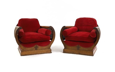 A pair of mahogany Art Deco style armchairs