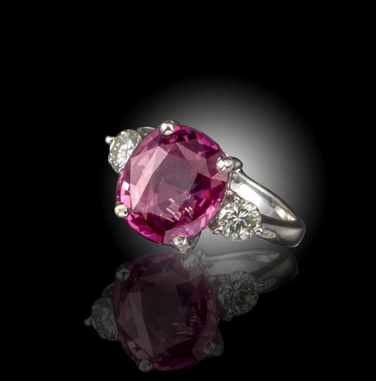 A pink spinel and diamond ring, the cushion-shaped...
