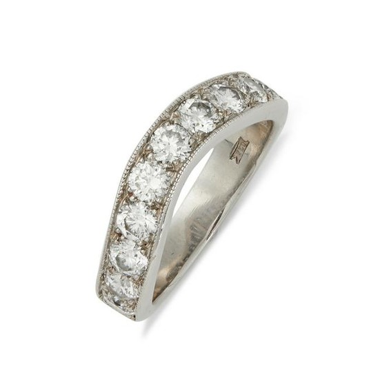 A platinum diamond half eternity ring.