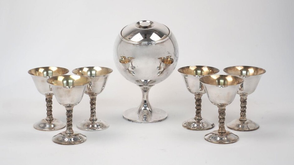 A silver plated globular ice bowl, raised on a pedestal foot, with pull-off lid and glass lined interior, 22.5cm high, together with six silver plated wine cups, stamped Casa Pupo Spain to bases, 13cm high(7)