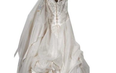 A strapless ivory designer wedding dress by Maureen Myring Kesterton.