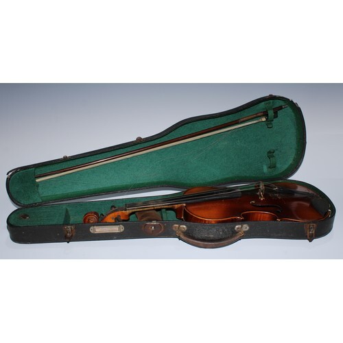 A violin, 35.9cm two-piece back excluding button, outlined t...