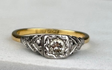 AN 18CT GOLD AND PLATINUM RING WITH A DIAMOND,...
