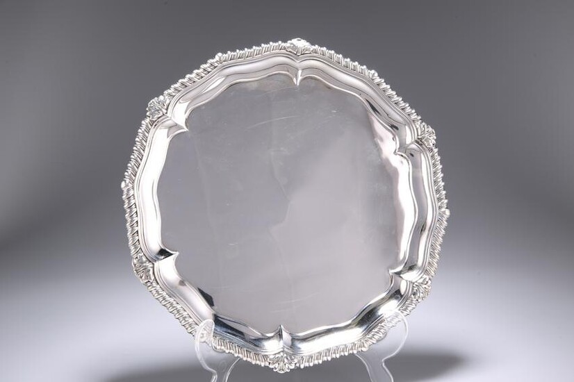 AN EARLY VICTORIAN SILVER SALVER, London 1840, shaped