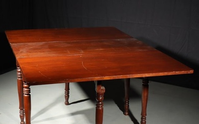 American Sheraton gate leg full length drop leaf cherry wood dining table. 29 1/2"H x 66"W x 45"D