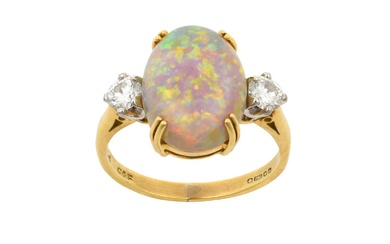 An 18 Carat Gold Opal and Diamond Three Stone Ring...