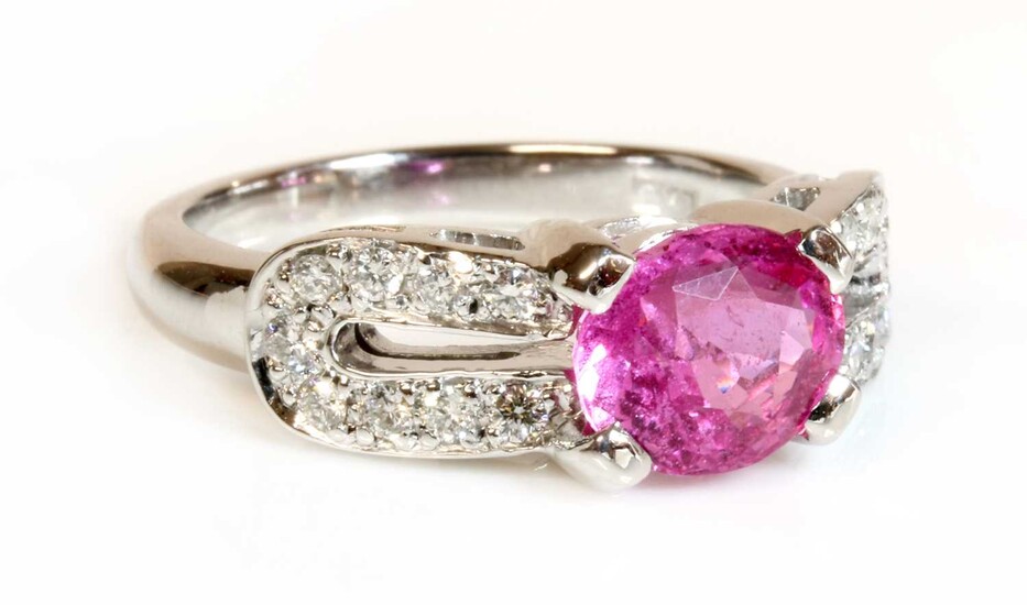 An 18ct white gold pink sapphire and diamond ring