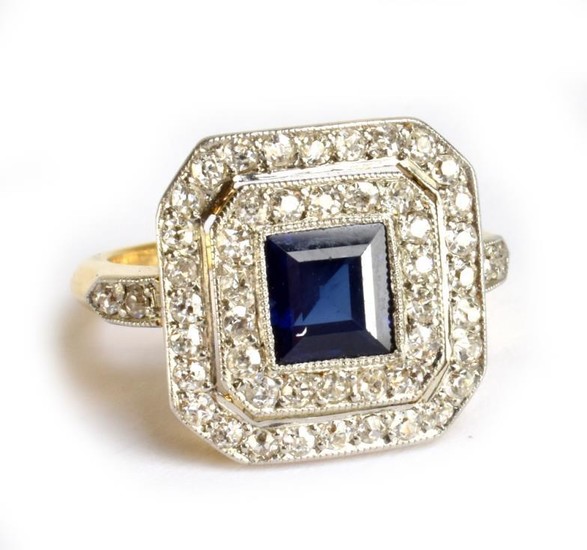An 18ct yellow gold diamond and sapphire ring in...