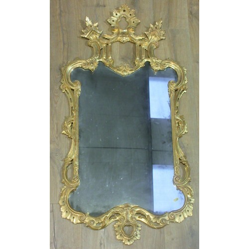An 18th Century Rococco influence gilt framed Wall Mirror wi...
