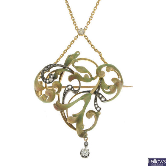 An Art Nouveau gold, diamond and enamel brooch/pendant, with old-cut diamond accent chain.