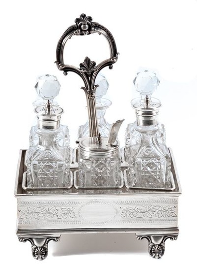 An English silver plated and glass cruet stand...
